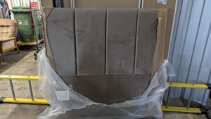 Elegant grey velvet 2-seater sofa, refurbished for stylish comfort. Perfect for living rooms, showcasing luxury and durability with premium fabric.