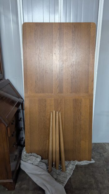 High-quality oak dining table, solid wood material, perfect for kitchens and dining rooms, sturdy construction, elegant design, ideal for family meals and gatherings.