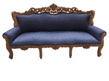 Sofa with carved wooden frame and navy blue fabric upholstery, showcasing detailed floral carvings on the frame, comfortable padding, and a traditional design, perfect for refurbished furniture in Northern Ireland.