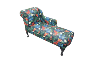 Colorful tropical print chaise lounge with floral leaves pattern, stylish black legs, perfect for living rooms, armchairs, bright décor, refurbished sofa in Northern Ireland.
