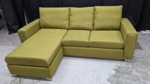 Stylish green corner sofa.