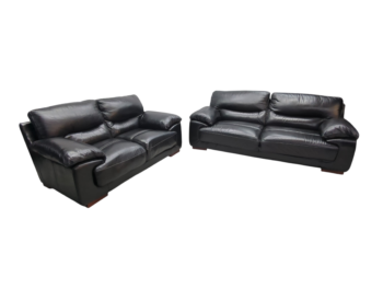 Black leather 2-seater sofa, contemporary style, plush cushions, sleek design.