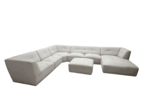 White corner sofa with matching ottoman, contemporary style, soft fabric upholstery.