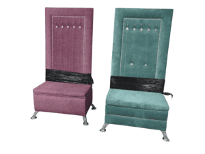 Elegant upholstered chairs in pink and teal with black accents