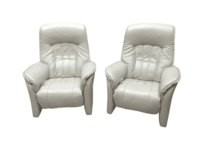 White leather armchairs, classic style, refurbished.