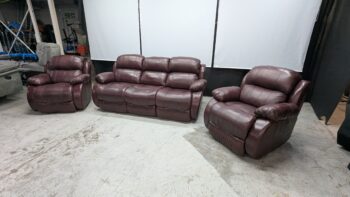 Recliner armchair in dark brown leather, plush and modern style.