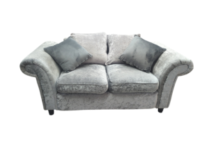 Grey plush 2-seater sofa with soft fabric and classic design.