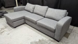 Modern grey corner sofa with chaise lounge