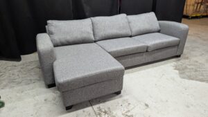 Modern grey corner sofa with chaise lounge