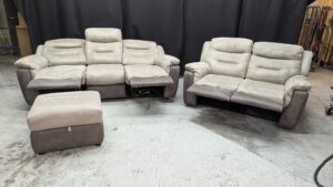 Modern beige corner sofa with matching footstool