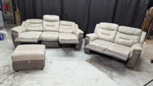 Modern beige corner sofa with matching footstool