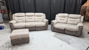 Modern beige corner sofa with matching footstool