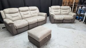 Modern beige corner sofa with matching footstool